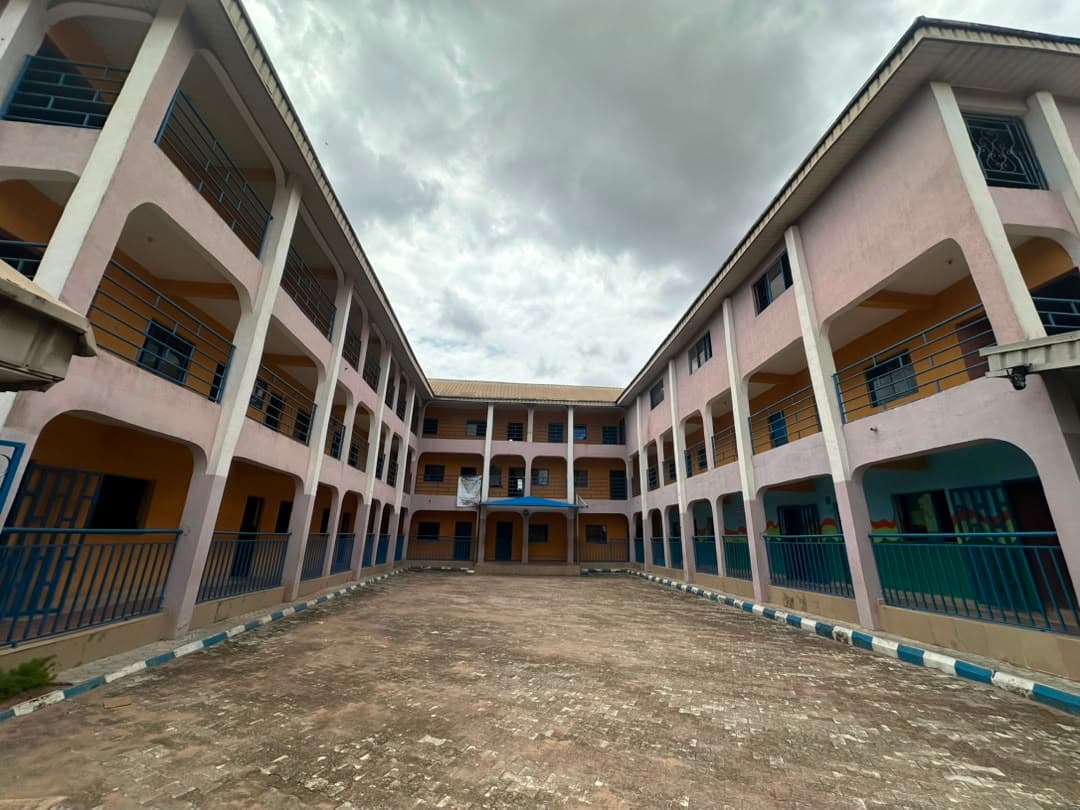 Winners' Foundation School courtyard surrounded by classroom blocks